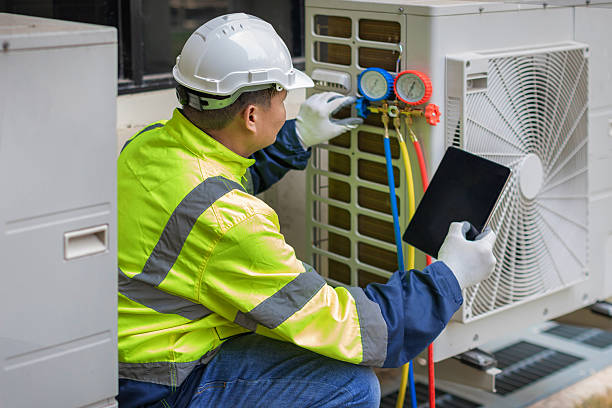 Professional Air Conditioning Repair technician working in Elyria, OH